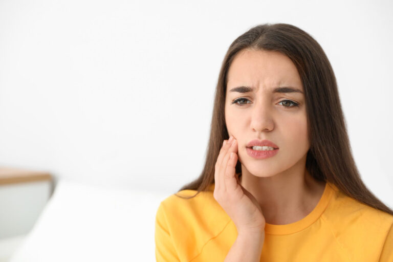 Lady Suffering With Tooth Pain